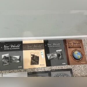 New World History & Geography Book Set - Black, Tan, Brown